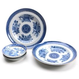 Antique Chinese Porcelain including Canton: A selection of antique Chinese porcelain tableware including two plates and three small dishes. The white porcelain pieces feature blue designs depicting Asian flora, architecture, and landscapes. The dish with the subtle scalloped rim and gold tone accents features a pagoda pattern with a scaled border. One of the small dishes is marked with Asian character stamps to the reverse.