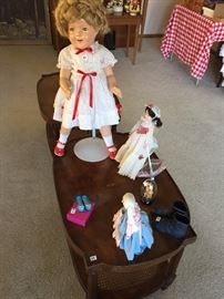 The second and older Shirley Temple doll and a Mary Poppins doll