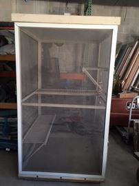 Custom mobile cage ( used for sugar gliders) all Screen Tite materials, wood shelving, , great urban chicken coupe.