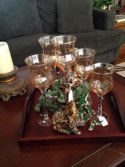 Decorative tray, candle holders, and giraffe