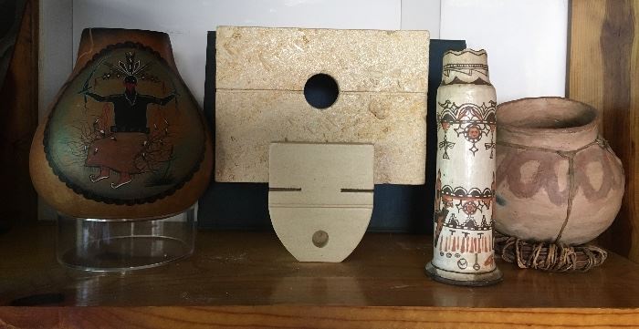 center: 2-Piece Texas Shell Stone Sculpture by Arlo Namingha; left:  Apache Spirit Dance Gourd; right of center Zuni Pictorial Pottery Candlestick