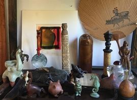 Japanese "Face" Box; Small Carved Wood Figure; Modern Snuff Bottle; Small Bronze Sea Horse and Owl; Ceramic Elephant; background: Merlyn Chesterman, b.1949,  "Black Jar", Woodblock print,  10"x9",