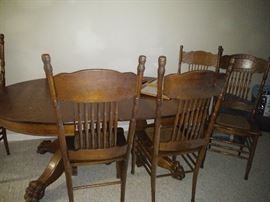 antique dining table and chairs