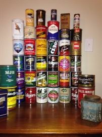 Collection of vintage coffee cans from 1920s to 1999