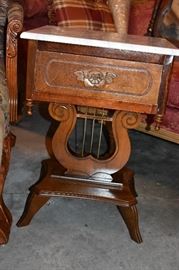 A closer look at these Beautiful Marble Top Lyre Lamp Tables