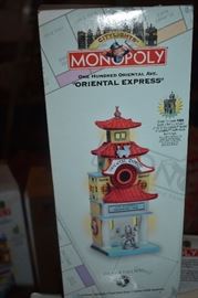 "City Lights" Monopoly Christmas Village all like new in box with all attachments, lighting adapters, etc. selling as a set.