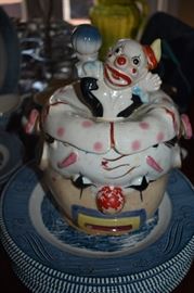 Very rare and unusual Antique Clown Cookie Jar has a chip on the fold of the lid which you can see in the 2nd picture but not visible in a front on look for display.