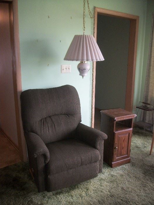 Lazyboy Recliner, hanging lamp and side table