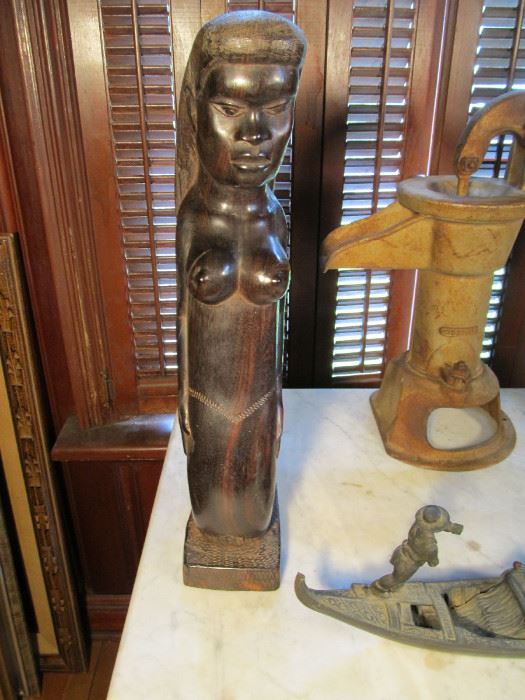 One of a pair on early ebony African Carved Mermaids 18" high. rare subject matter 