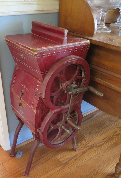 Floor antique butter churn with side crank.