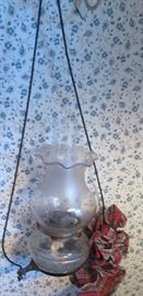 Hanging oil lantern in frame