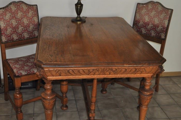 Set of 4 antique oak chairs, lion head hand carved library table c 1880-1890