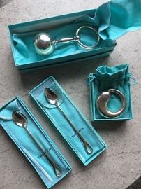 Vintage Tiffany baby spoons and teething rings.