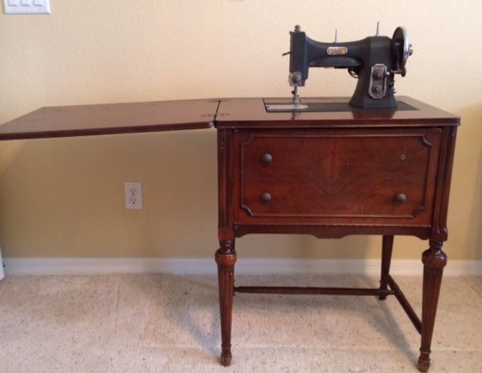 White Sewing Machine in Wood Cabinet