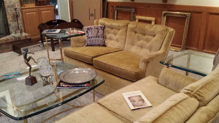 Pair of loveseats and matching brass and glass coffee and two lamp tables.
