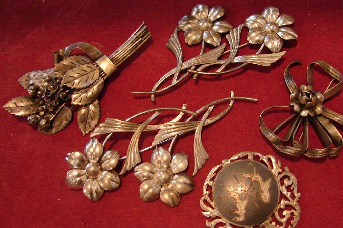 Silver brooches