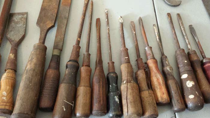 Take your choice of vintage screw drivers and chisels