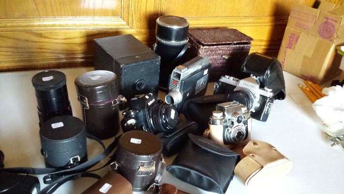 Cameras in various conditions and of various makes.