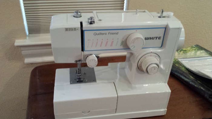 White quilting sewing machine