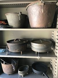 Copper kettles and cast iron including dutch oven by Knoxville Stove Works.