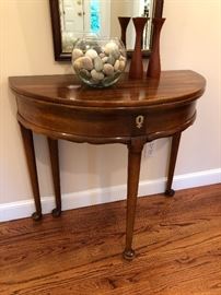 Mahogany Flip-top Demi-lune table (candlesticks on top not for sale)