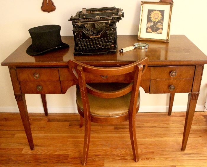 Desk with Chair, underwood type writer, top hat.