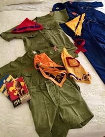 Vintage Boy Scout and Cub Scout uniforms, scarves, manuals.