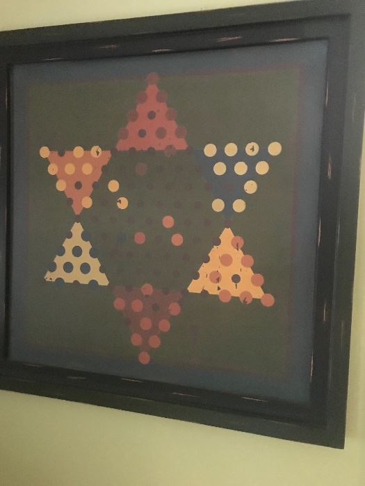 an old Chinese Checker board framed