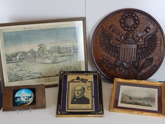Hand painted scene on glass of Niagara Falls,RR Donnelly print of Amos Doolittle Lexington Battle Scene hand tinted, a Garfield death silk in Eastlake frame, hand carved eagle plaque and a hand tinted early print of New York Bay