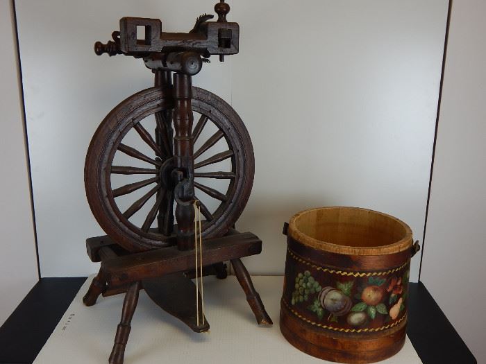A very early double spinning wheel from an estate in Marblehead, Ma and a country firkin with great painted decoration
