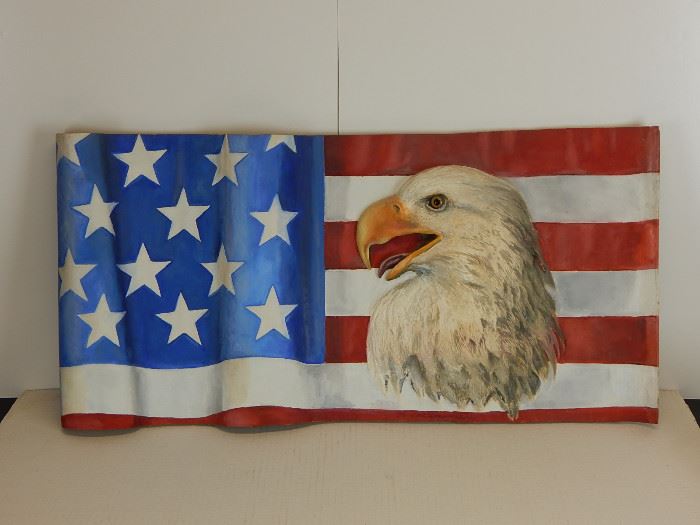 A very large and impressive carved wooden American eagle complete with undulating waving flag by Ted Slawinsky- 30" wide with glass eye! Very impressive!