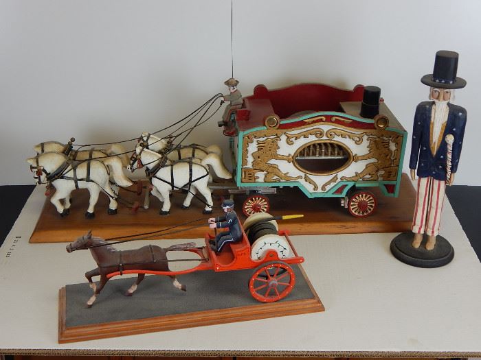 A wonderful 1920's carved wooden Circus Wagon with calliope player and stove attendant inside wagon and very detailed horses and rig. Great piece! Carved Uncle Sam and a contemporary horse and buggy by NJ carver, Ted Wyka