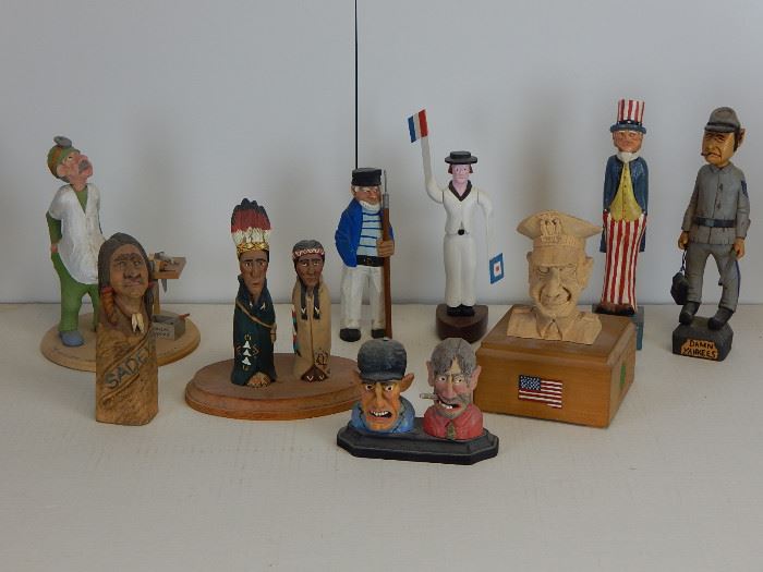 Another carving grouping including "Memories of Operations Past" by Richard Jensen of Statin Island in which the good doctor seems to be remembering his best.