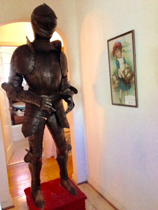 Suit of Armor used in a Vincent Price Production.  Suits of Armor were made to display in hallways of large estates and quite often used in movie productions such as this one.