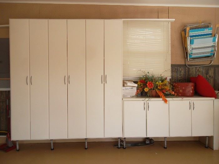 everyone needs these!!!  2 sets - garage storage cabinets