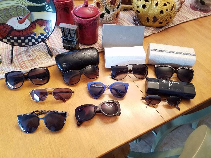 Chanel, Gucci, Dior, Jimmy Choo,  Maui Jim and wouldn't be complete with Prada!  sunglasses