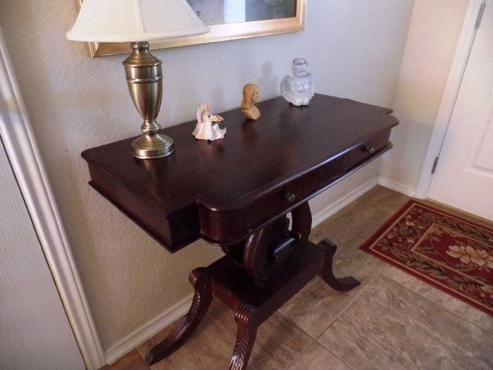 Gleaming antique lamp table
