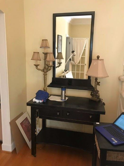 #12	black side table w 2 drawers 40x20x33	 $175.00 
Mirror not included 

