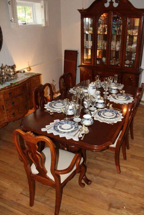 Queen Anne table with the 6 chairs with white fabric.