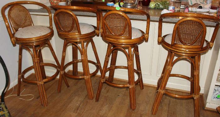 The bamboo bar stools with fabric seats.  They swivel.