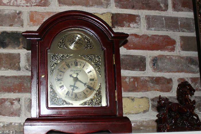 The mantle clock.  Chimes on the hour.