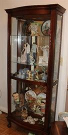 Another curio cabinet in foyer with the Llardo along with others.