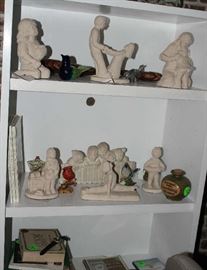 Austin figurines in the white bookcase.