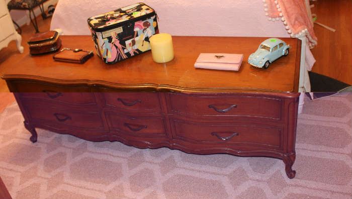 The French Provincial cedar chest.