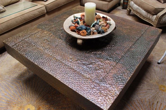 Hand hammered metal clad coffee table.