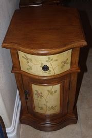 Decorative end table/cabinet.