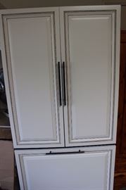 French door fridge freezer with cabinetry style covered doors.
