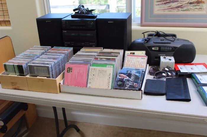 Large selection of CDs, and DVDs. Stacking stereo with multi CD changer. 