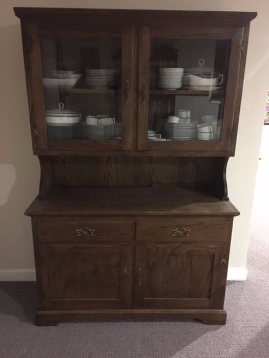 Two Piece Oak hutch with display case on top of base unit