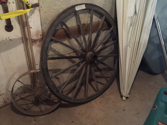 antique wagon wheels- metal and wooden